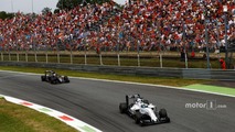 Felipe Massa, Williams FW38 Mercedes, leads Fernando Alonso, McLaren MP4-31 Honda