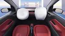 Wuling Hong Guang Mini EV Cabrio interior dashboard with airbags open