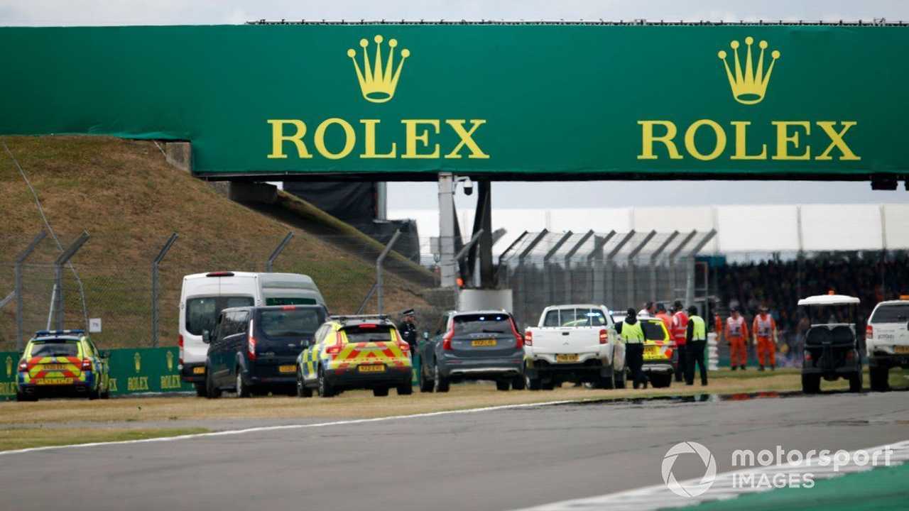 Police dealing with protestors at the British GP 2022