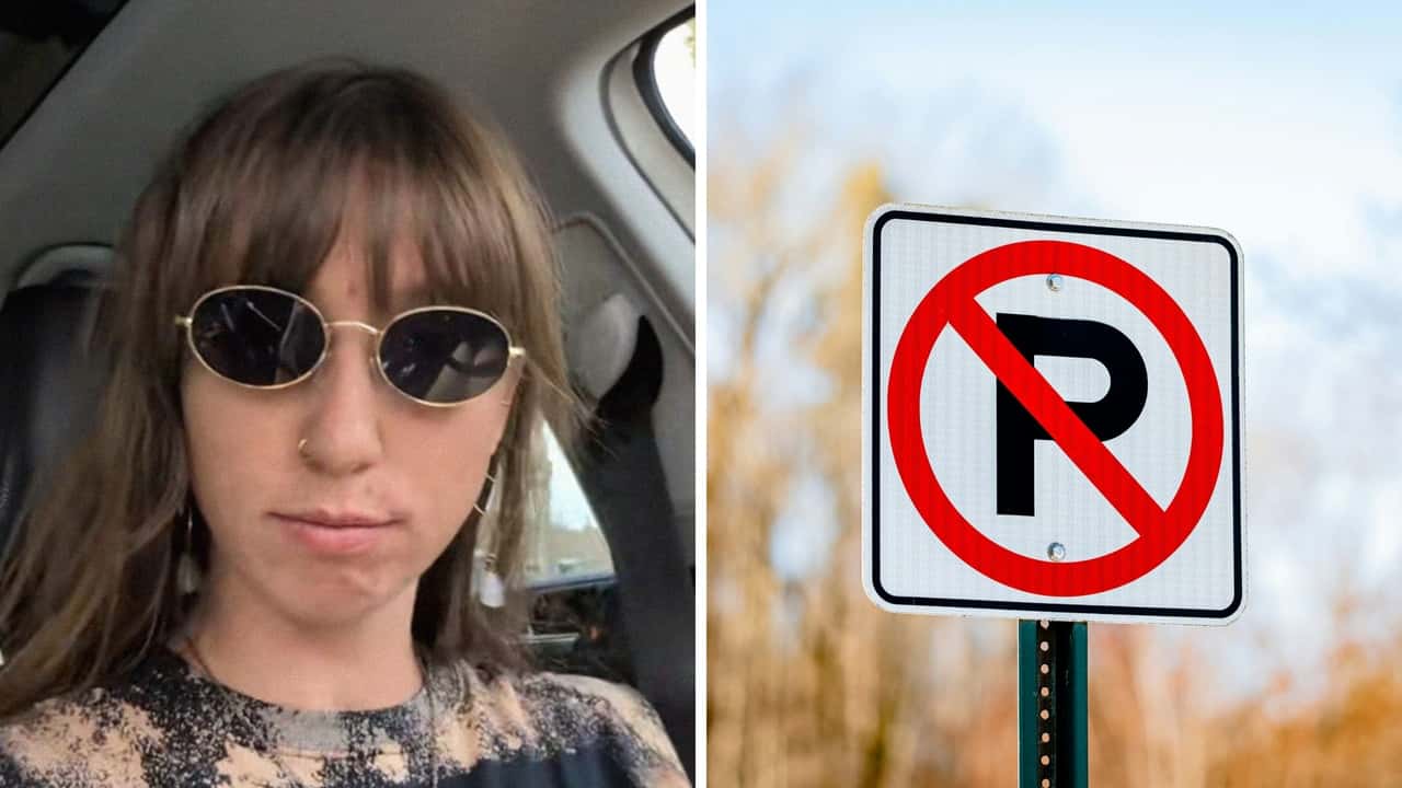 she sees a sign that says no parking for Ford