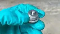 DIY Volvo ERAD fluid change on a 2023 V90 Plug-in Hybrid. I cleaned the drain plug of the metal shavings and reinstalled it.