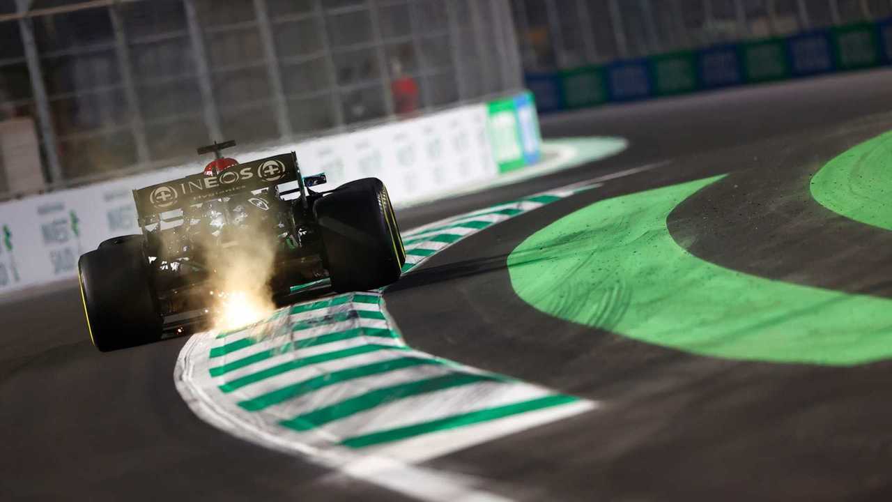 Sparks kick up from Lewis Hamilton, Mercedes W12