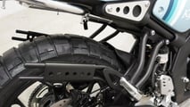 The Kijima XSR125 gets stylized saddle bag supports on either side.