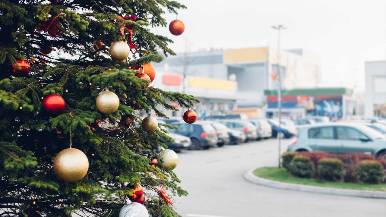 Christmas tree in parking lot of shopping centre