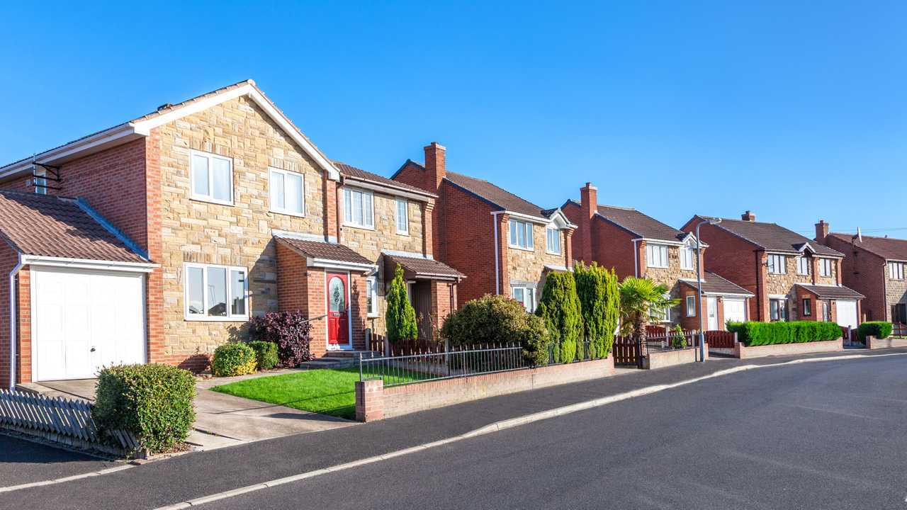 Typical English suburban residential street with homes