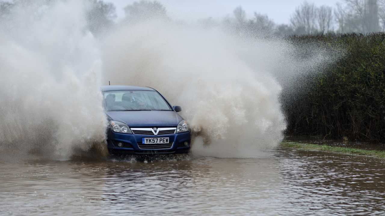 Car driving through flood water in Nottinghamshire UK
