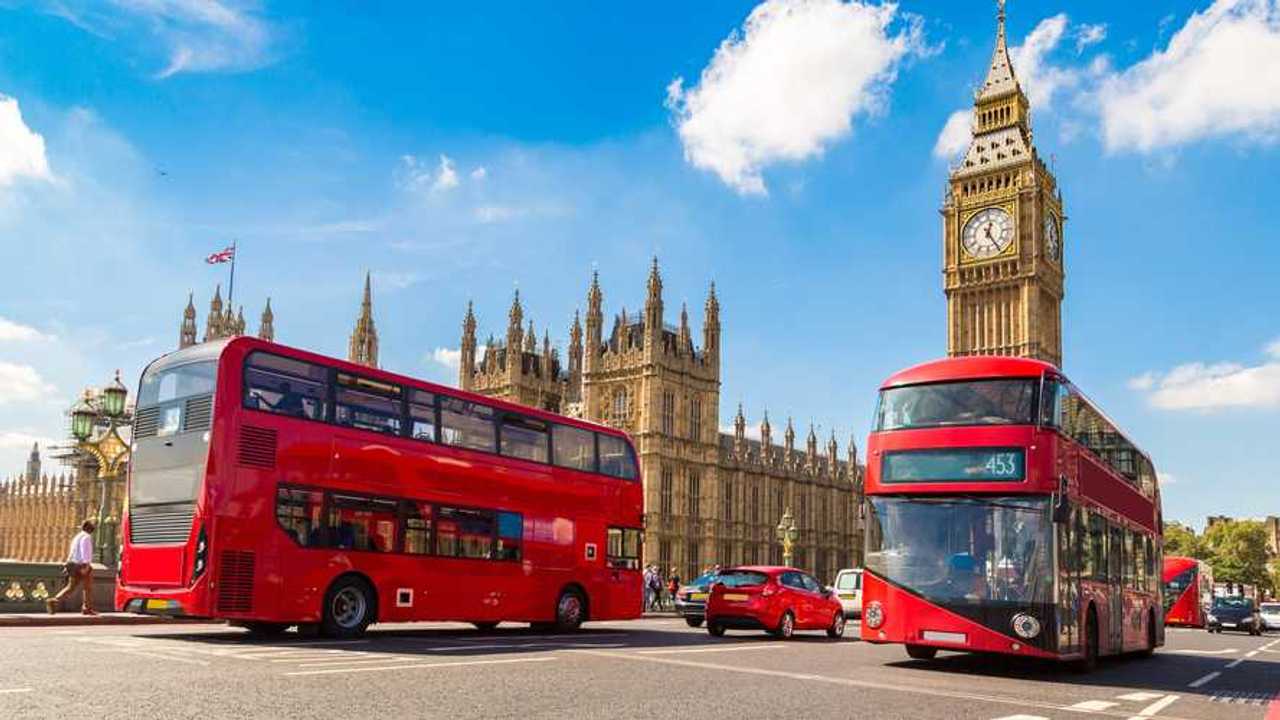 Big Ben, Westminster Bridge and red double decker bus in London