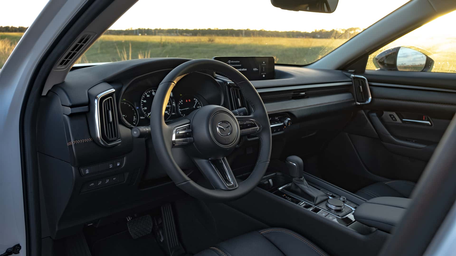 https://cdn.motor1.com/images/mgl/MkYn7N/s1/2025-mazda-cx-50-hybrid-first-drive-review.jpg