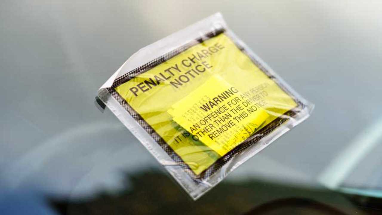 Parking fine attached to windscreen