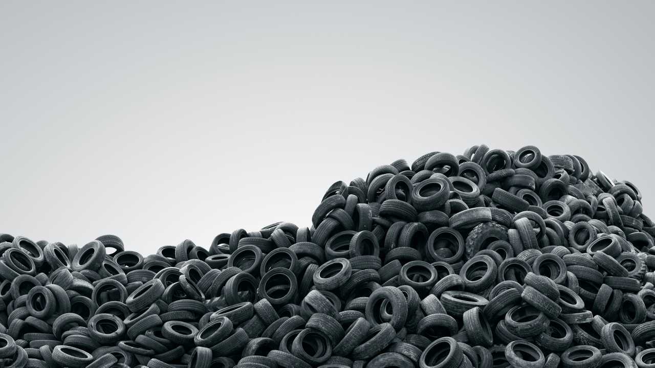 Pile of used car tyres