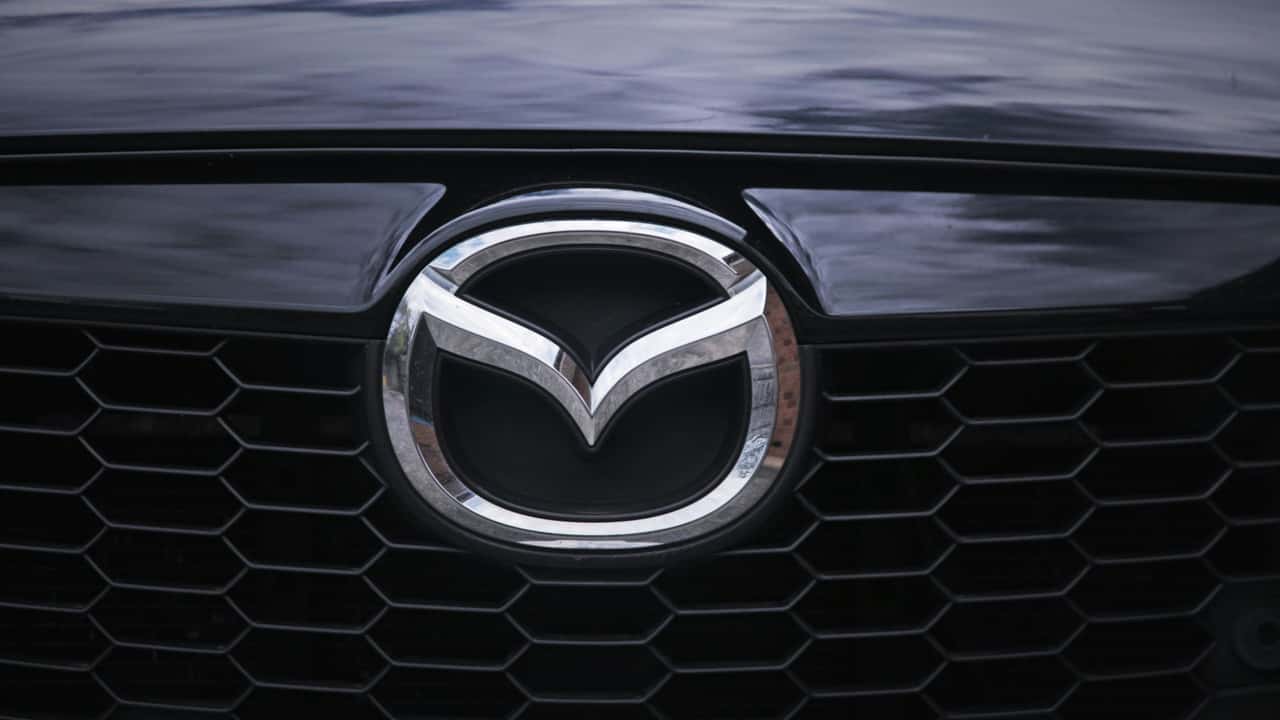 Couple Buys A Mazda