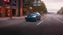 2023 Volkswagen ID.4 exterior front three-quarter view city driving