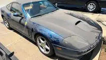 Ferrari 550, BMW M5 e Ford GT in un garage