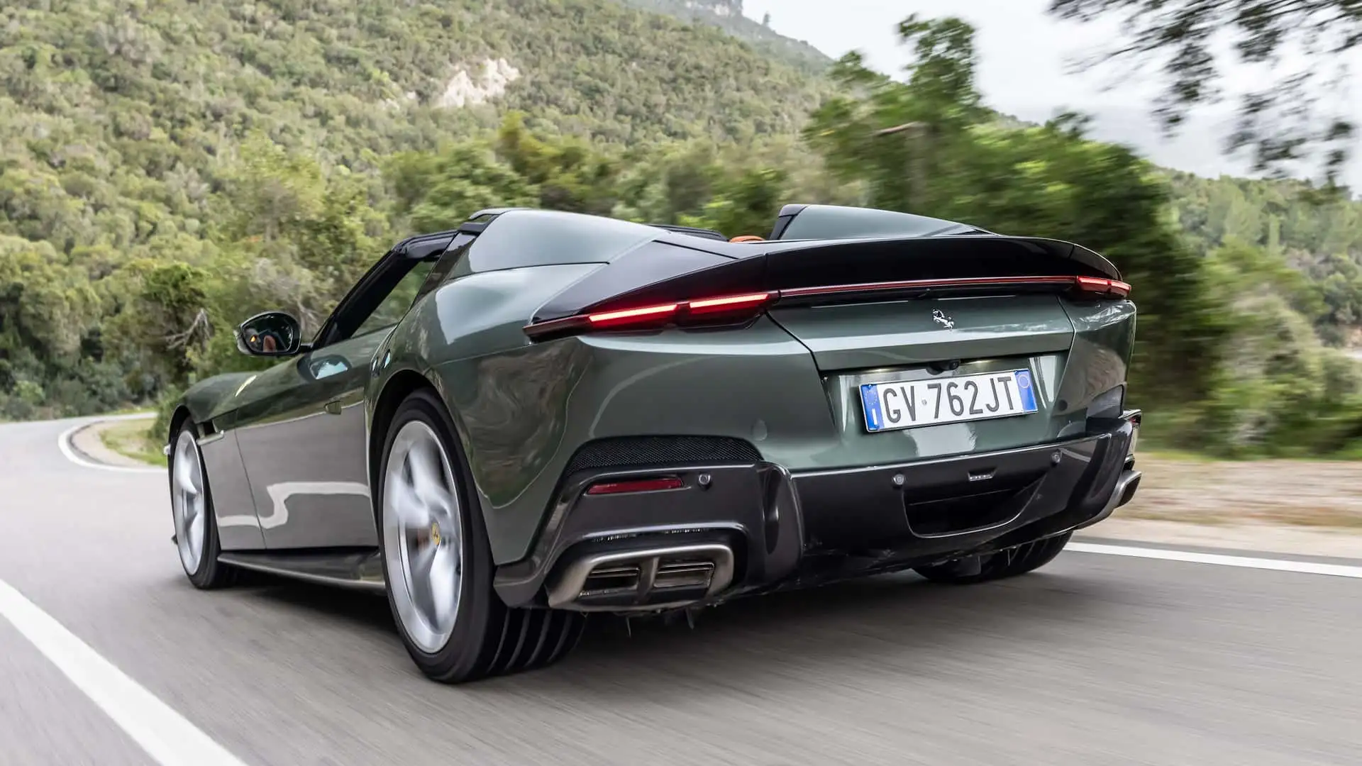 https://cdn.motor1.com/images/mgl/NGKZGy/s1/2025-ferrari-12cilindri-spider-first-drive-review.webp