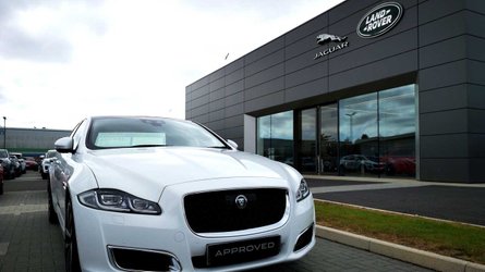 Used car market sees post-lockdown surge, web searches suggest Used Jaguar XJ outside Jaguar Land Rover showroom in Cardiff
