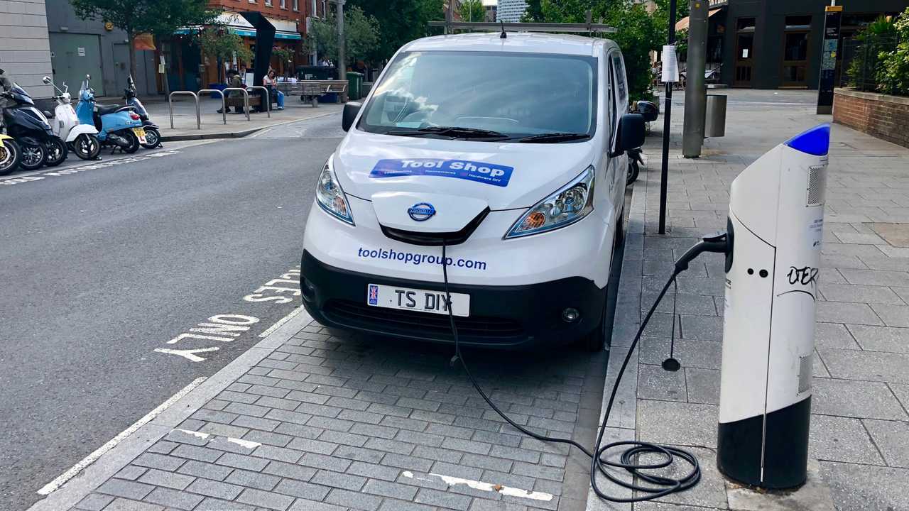 Commerical electric vehicle van uses a charging station in London