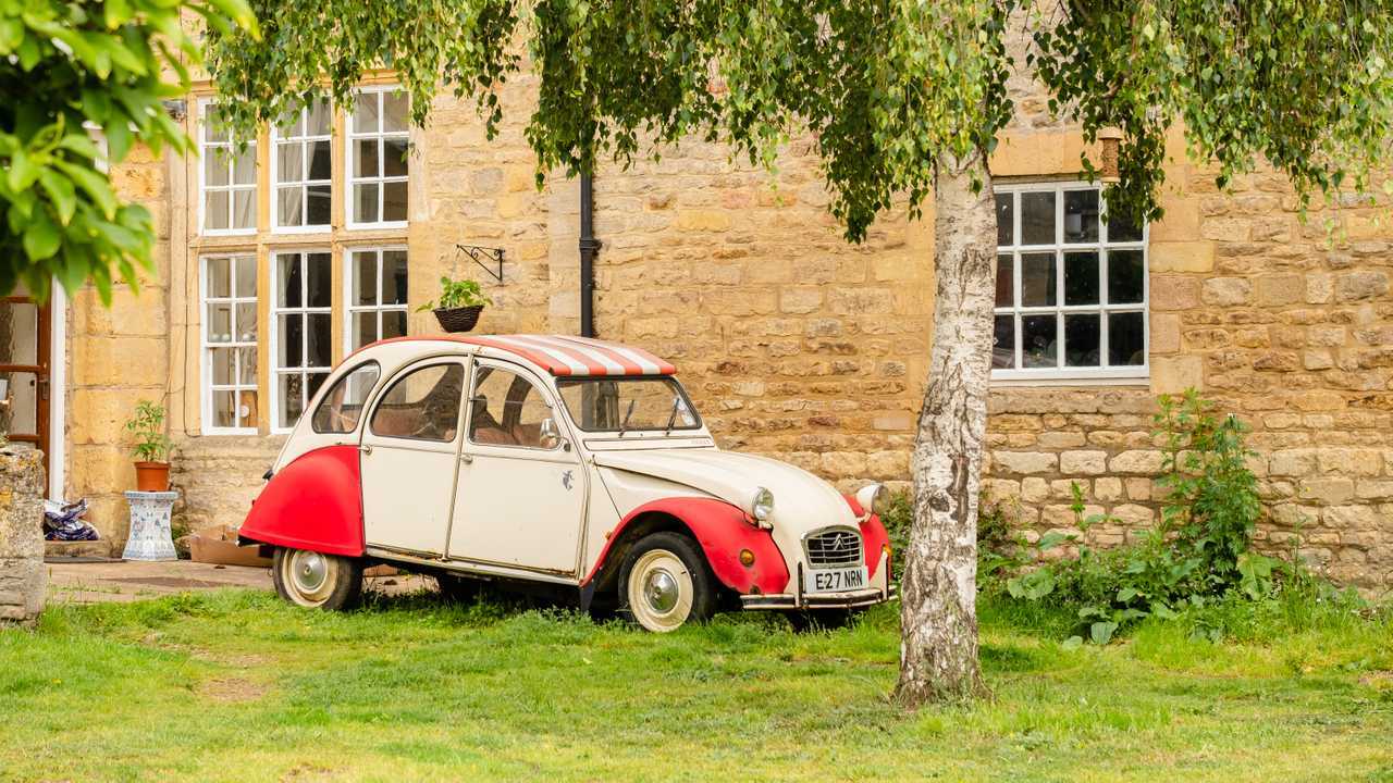 Citroen 2CV parked in front of house in Cambridge UK