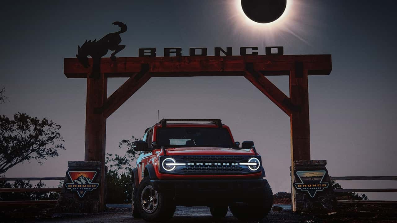 Front view of a Ford Bronco during a fake solar eclipse.