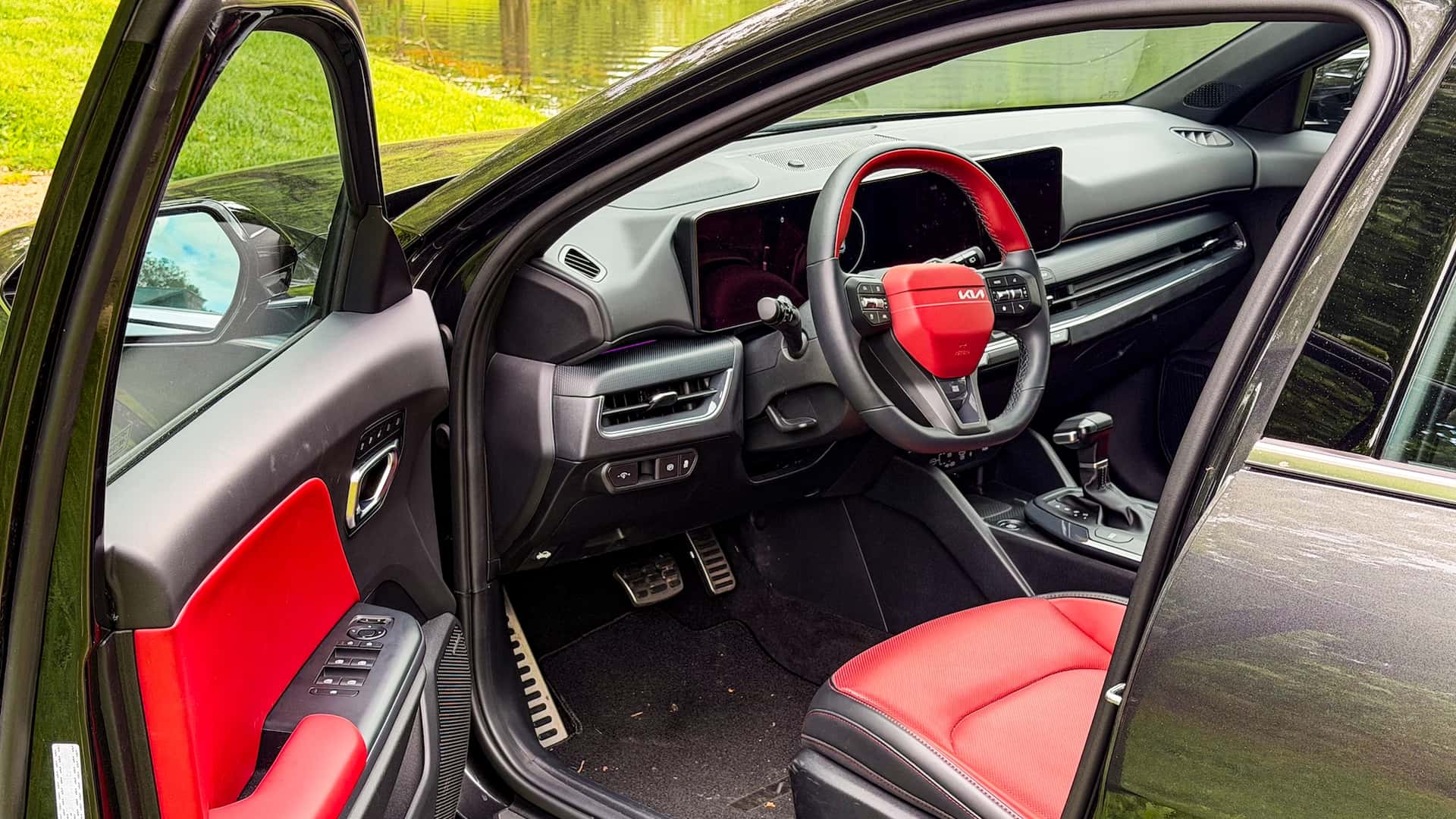 https://cdn.motor1.com/images/mgl/Oo9w0R/s1/2026-kia-k4-hatchback-review.jpg