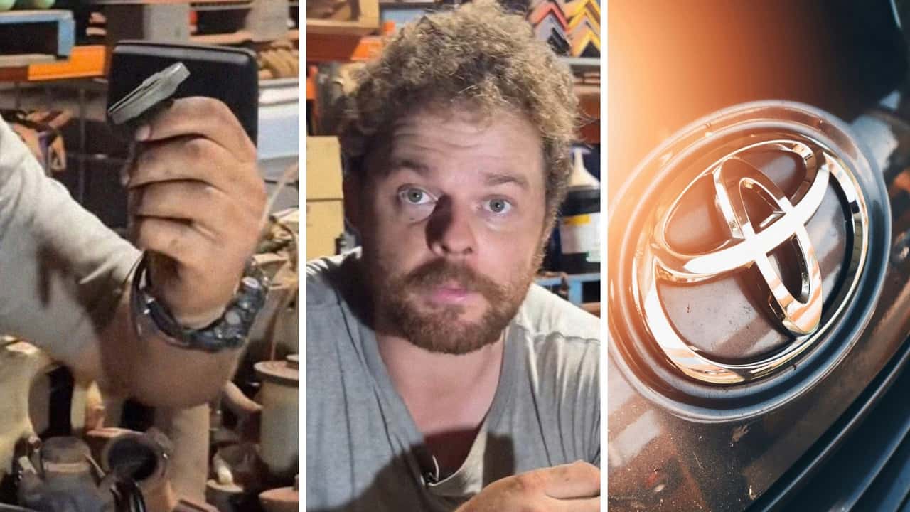 Mechanic Works On Toyota.jpg