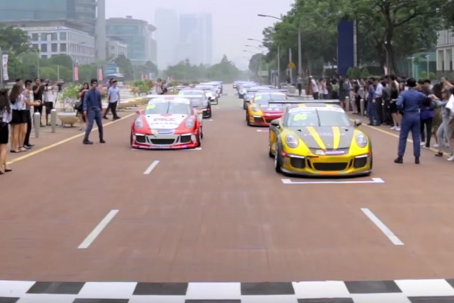 Watch a Porsche 911 Carrera Flash Mob on the Streets of Kuala Lumpur