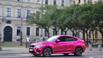 BMW X6 M with pink chrome wrap