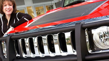 Susan Docherty and a Hummer H3