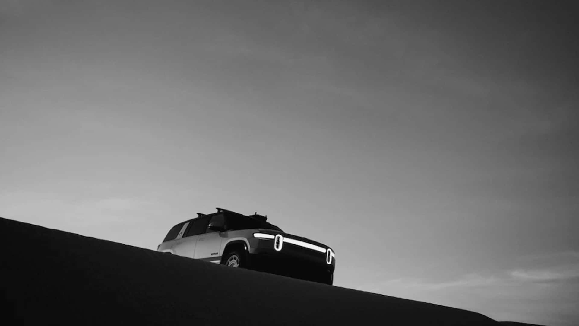 https://cdn.motor1.com/images/mgl/P3MzlK/s1/rivian-adventure-department.jpg