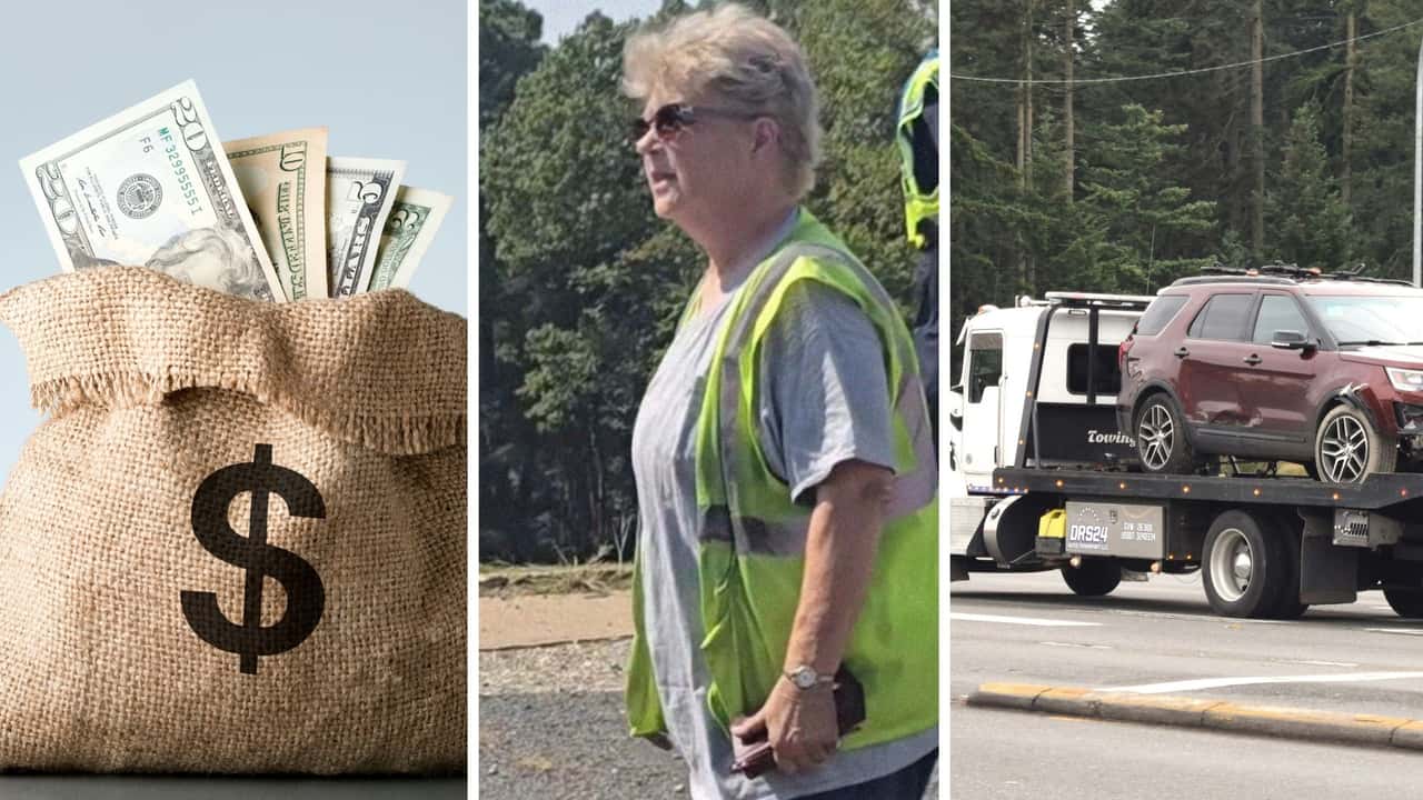 Woman’s Work Truck Gets Towed.jpg