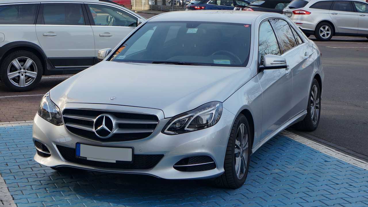 Mercedes improperly parked on a blue badge spot for disabled people