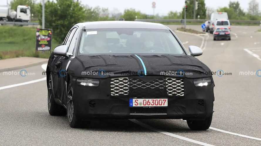 New Genesis G90 spied with snazzy wheels, full body camouflage