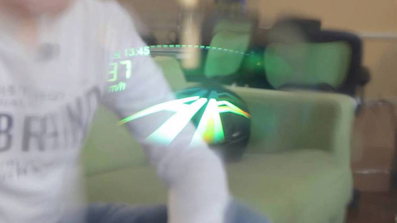To reiterate: This is a prototype, which was hooked up to Andrew's laptop in order to function. All the parts used as well as the HUD imagery will be refined once the helmet is produced.