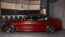 BMW M550i xDrive Aventurine Red
