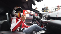 Sebastian Vettel with the Ferrari F12berlinetta