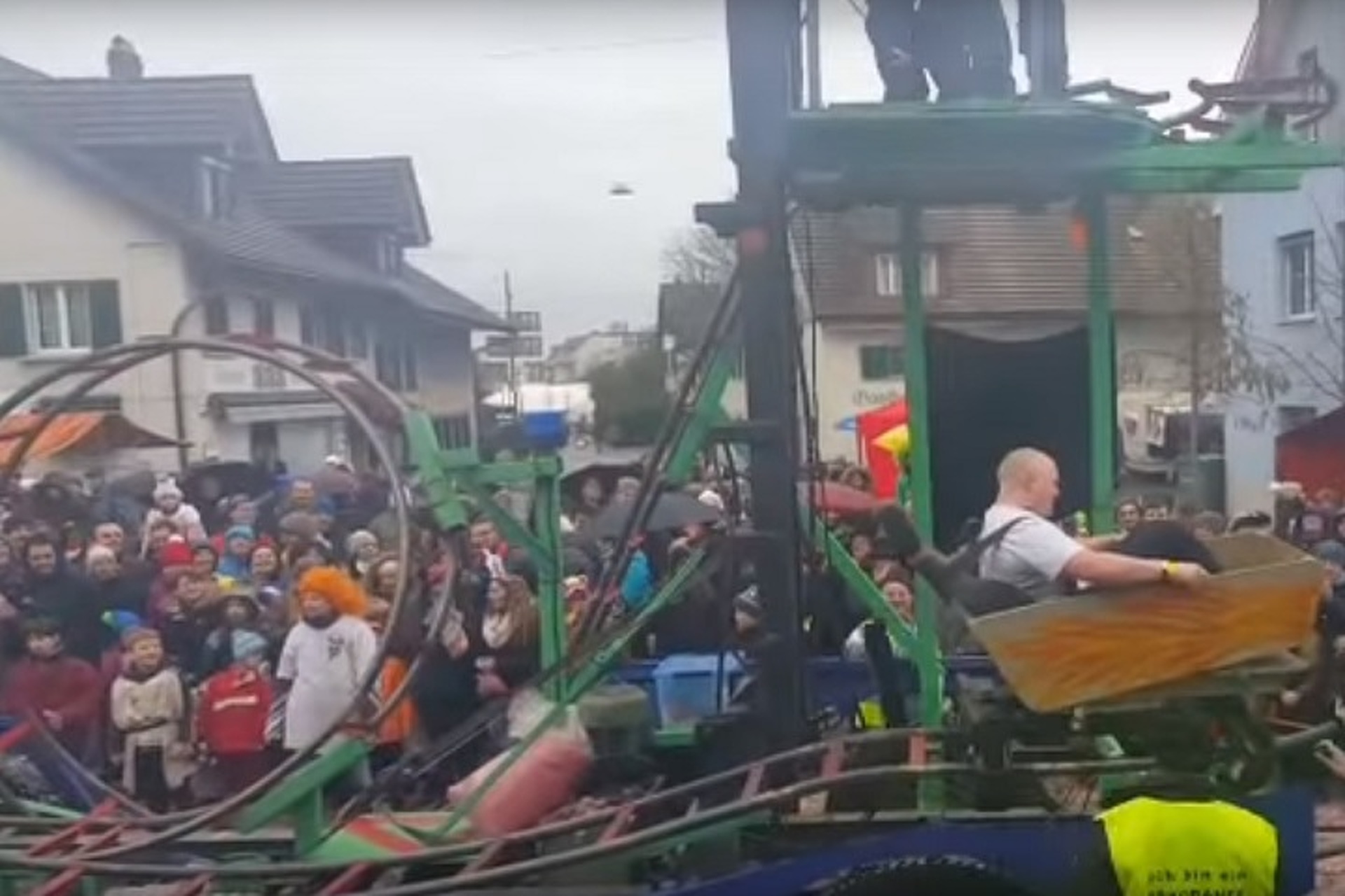 Watch a Crazy Parade Float with a Working Roller Coaster