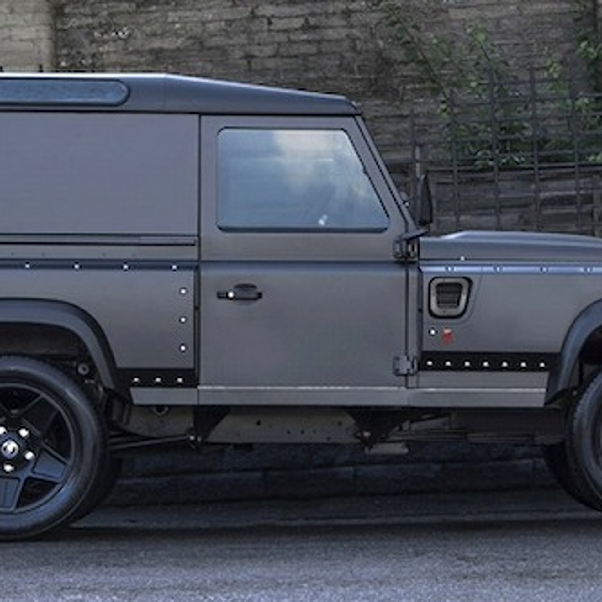 A. Kahn Delivers a Duo of Land Rover Defenders