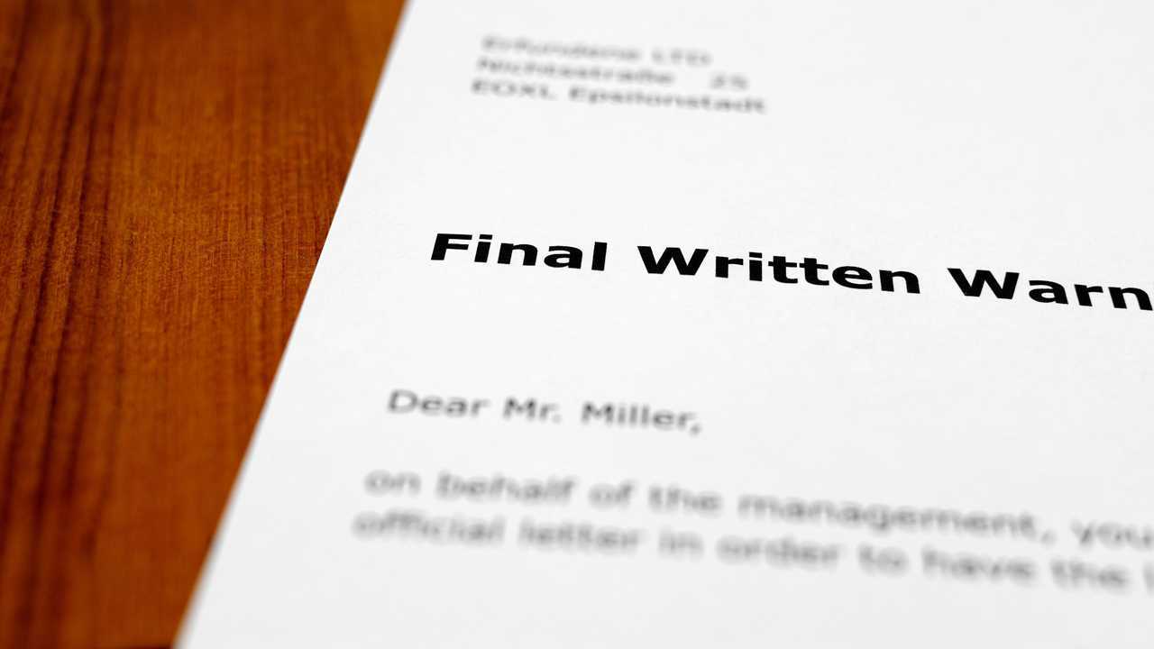 Final warning letter on table