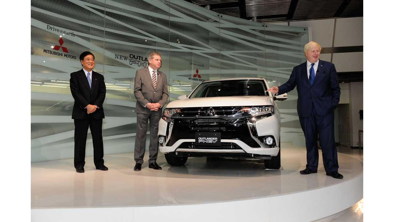 Mitsubishi Chairman and CEO Osamu Masuko, UK Managing Director Lance Bradley and Mayor of London, Boris Johnson at the 2016 Mitsubishi Outlander PHEV unveiling in Tokyo.