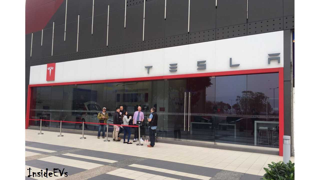 The first new buyers arrived very early at the Tesla store hoping to get their orders in for priority deliver, despite not already being owners