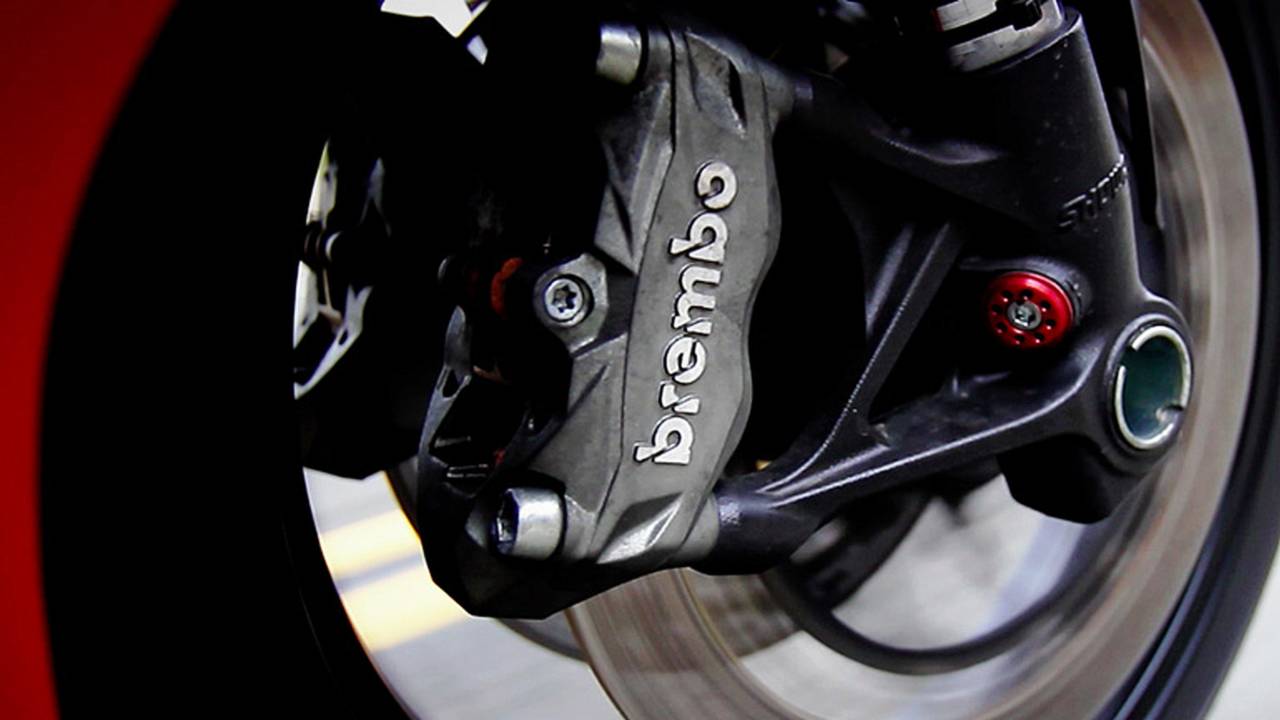 Radial Brembo Monoblocks. Not the 1199's fancy M50s, but they still work exceptionally well.