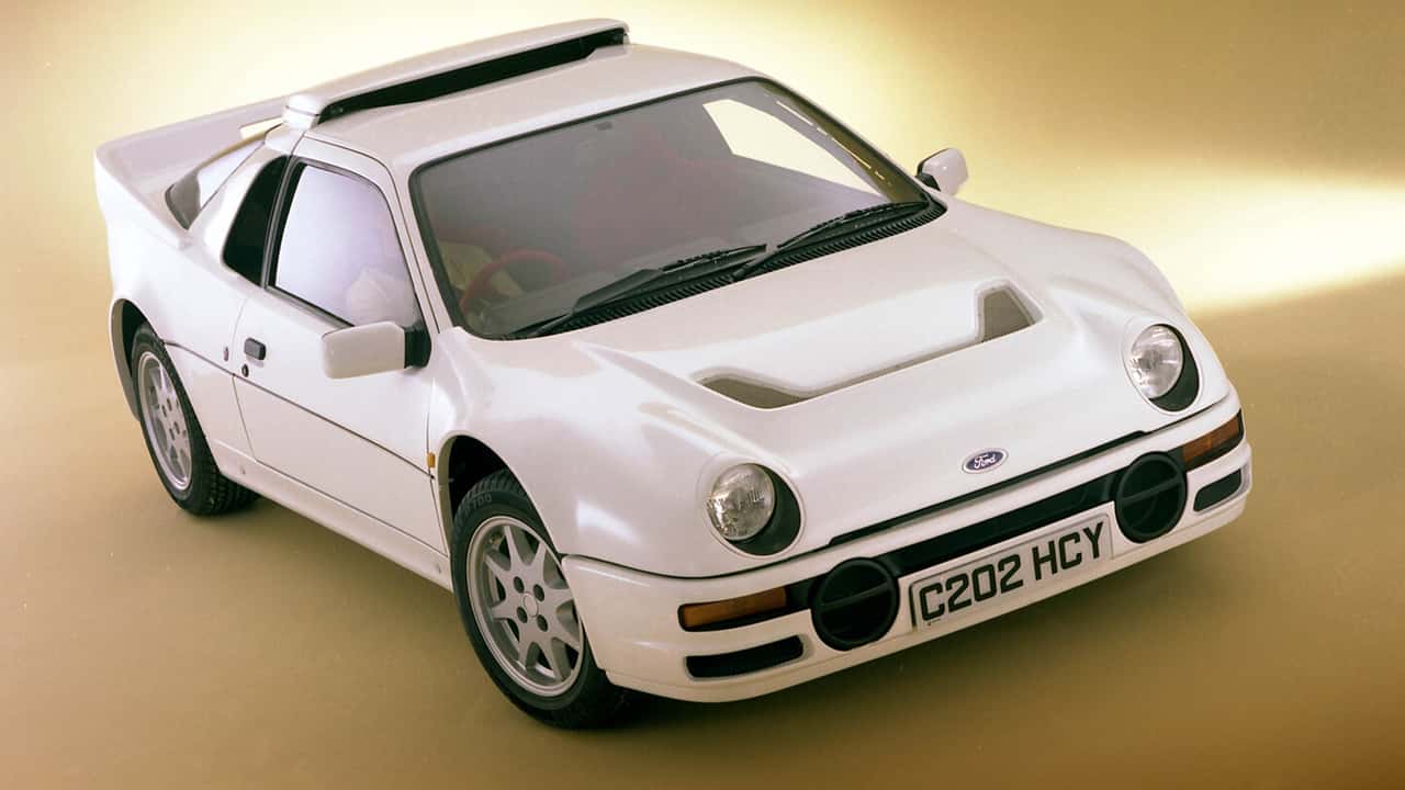 Front view of a white sports car called the Ford RS200.