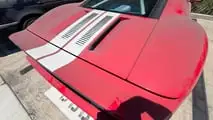 Ferrari 550, BMW M5 e Ford GT in un garage