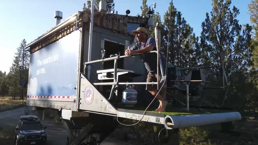 Airline box truck with scissor lift is now a custom camper with a view