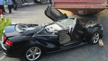 Audi S5 flattened by container