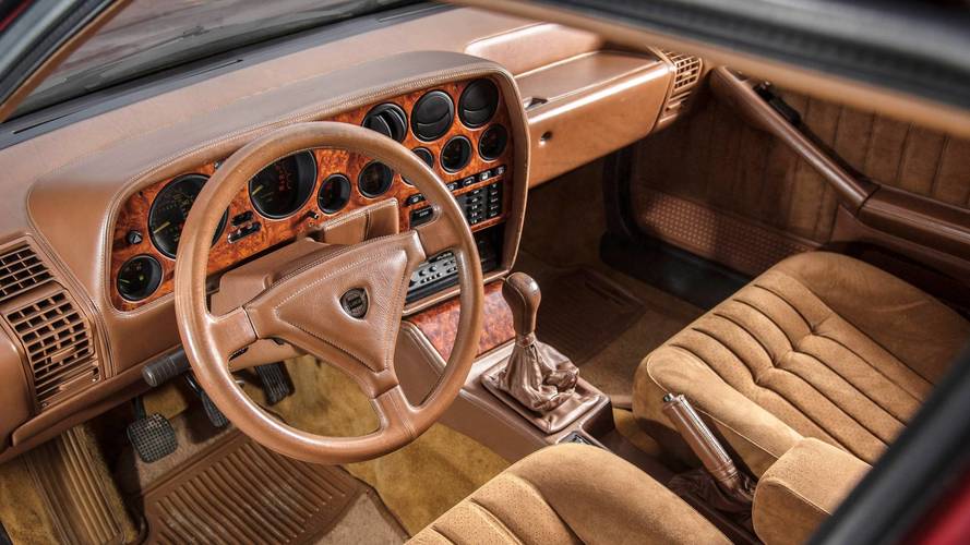 Rowan Atkinson auctioning off a pair of modern classics