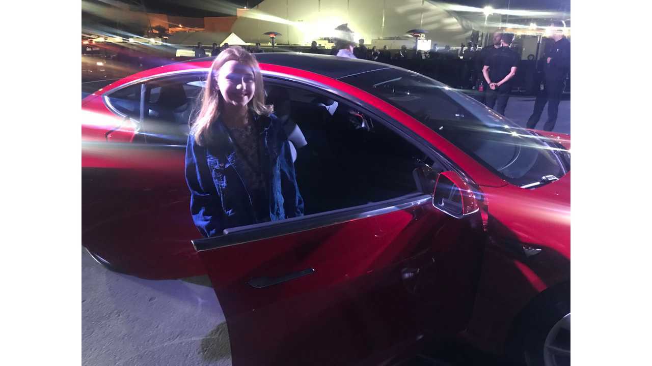 Bria, the youngest attendee at the Tesla Model 3 party, about to take a spin!