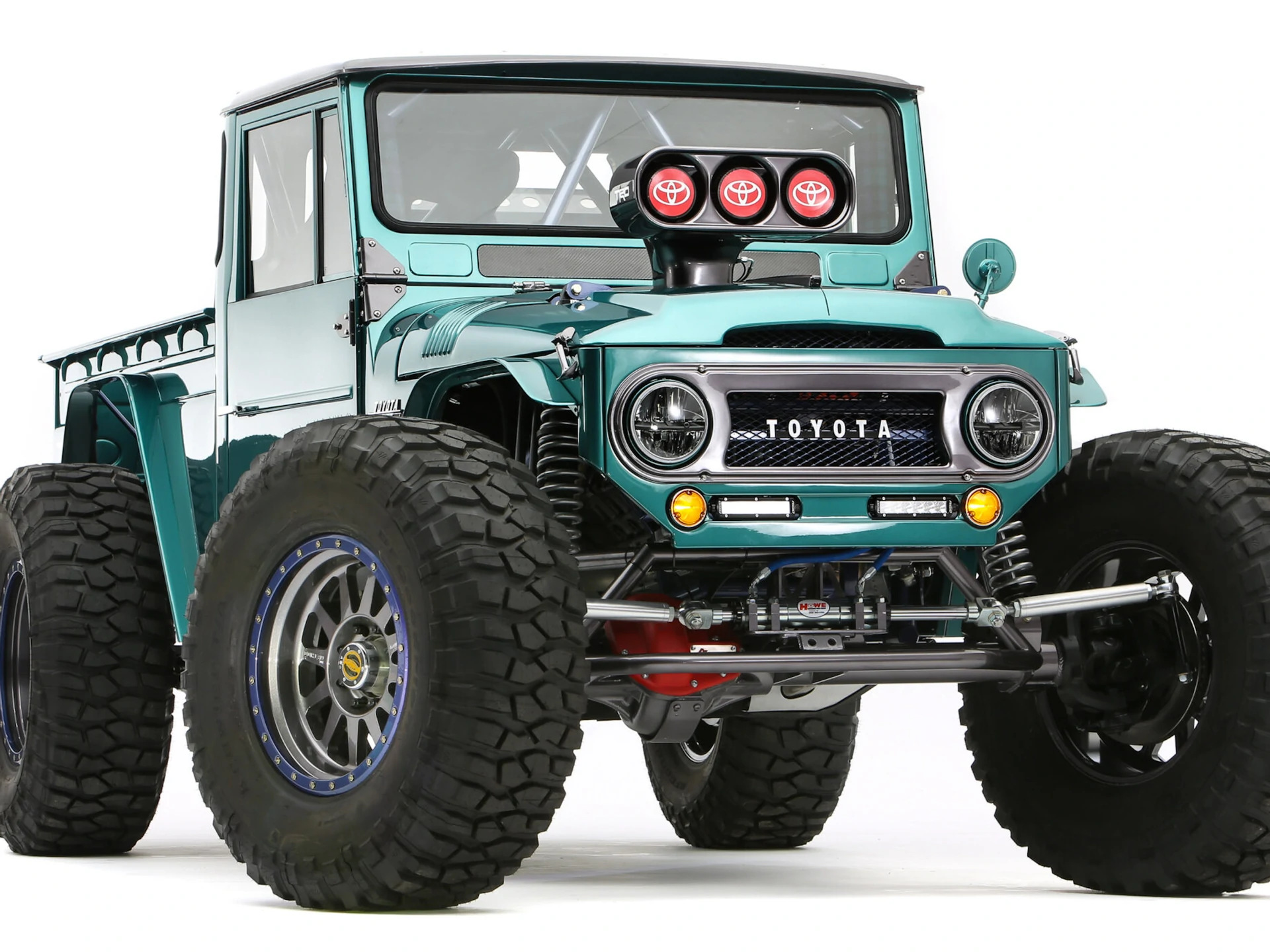 This Wild Toyota Land Cruiser Has A NASCAR Engine, Five Wheels