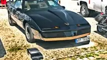 1982_Pontiac_Firebird_TransAm_with_remote-controlled_toy_car