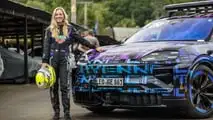 Gabriela Jílková with the Porsche Cayenne Electric