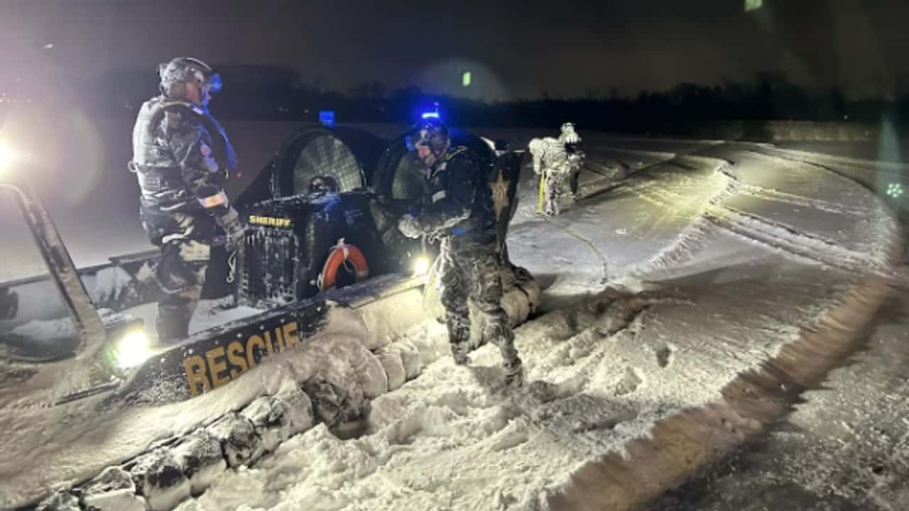 snowmobiler plunges into lake